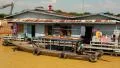 Floating village of Vietnamese refugees on Tonle Sap lake in Siem Reap, Cambodia HD Footage