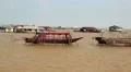 Floating village of Vietnamese refugees on Tonle Sap lake in Siem Reap, Cambodia HD Footage