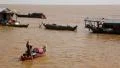Floating village of Vietnamese refugees on Tonle Sap lake in Siem Reap, Cambodia HD Footage