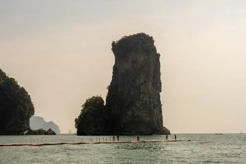 Floating walkway before limestone sea stack at Ao Nang 库存照片