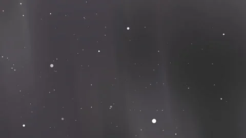 Floating white bokeh particles on an abstract dark grey background loop ani.. Видео 335009608