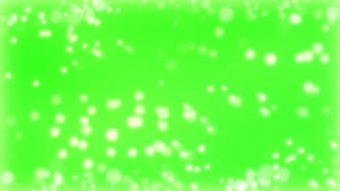 Floating white bokeh particles moving across vibrant neon green background 스톡 동영상 345329668