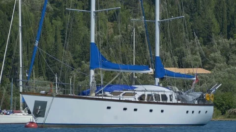 Floating Yacht on Harbor Stock Footage 77351958