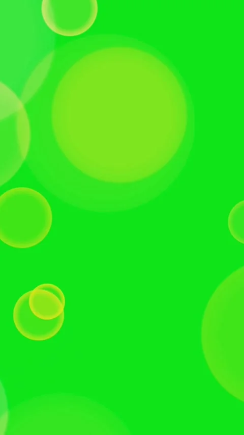 Floating Yellow Bokeh Bubbles on Green Screen Background Video stock 336623916