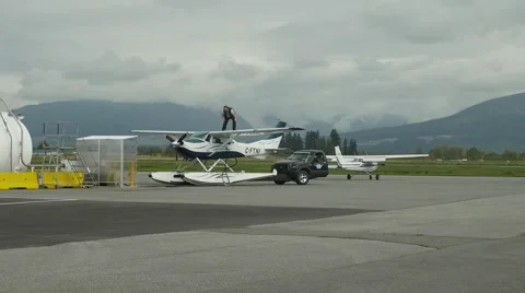Floatplane being filled up at airport. Stock Footage 49910686