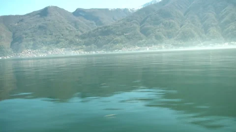 Floatplane flying above boat on Como lake  Stock Footage 41685416