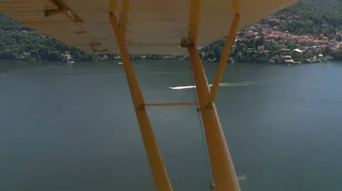 Floatplane flying on Como lake Stock Footage 32319628