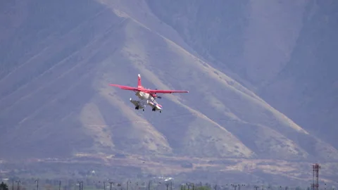 A floatplane flying in to land a Provo airport in slow motion Stock Footage 332045480