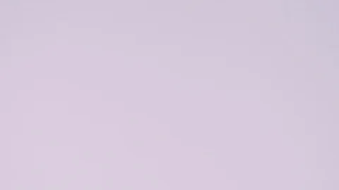 A flock of crows flies from left to right against the sky Stock Footage 91395929