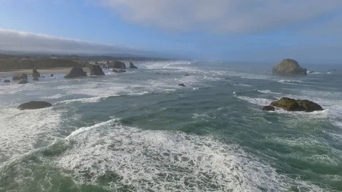 A flock of seagulls fly in the sky as a high aerial drone perspective Stock Footage 119655804