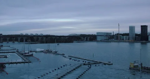 Flock of seagulls in harbor at dusk Stockbeeldmateriaal 94093110