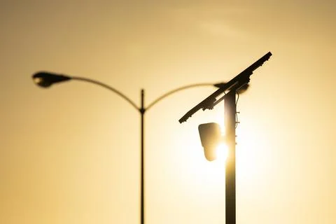 Flock Security Camera Sunset Stock Photos