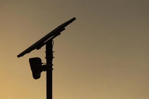 Flock Security Camera Sunset Stock Photos