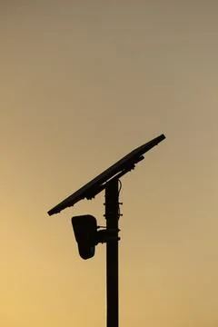 Flock Security Camera Sunset Stock Photos
