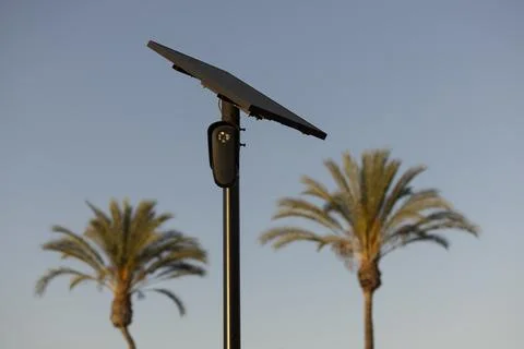 Flock Security Camera Sunset Stock Photos
