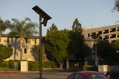Flock Security Camera Sunset Stock Photos