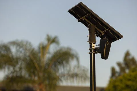 Flock Security Camera Sunset Stock Photos