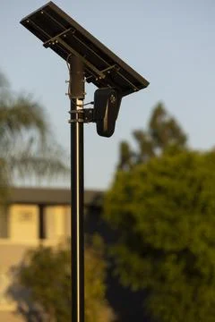 Flock Security Camera Sunset Foto stock