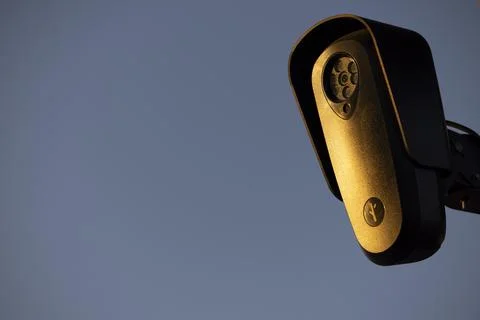 Flock Security Camera Sunset Stock Photos