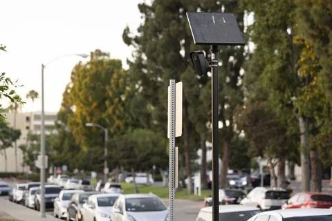 Flock Security Camera Sunset Stock Photos
