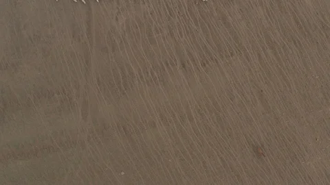 A flock of sheep grazing in the mountains 4K Drone Stock Footage 120175863