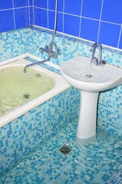 Flood in the bathroom Stock Photos