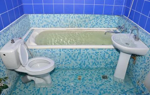 Flood in the bathroom Stock Photos