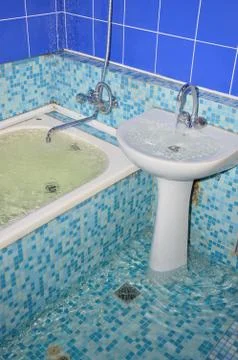 Flood in the bathroom Stock Photos