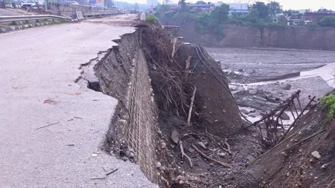 Flood damaged road in India Stock Footage 321039565