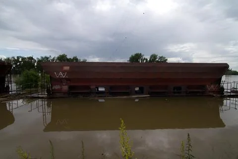 Flood Disaster freight train trailer under water Stock Photos