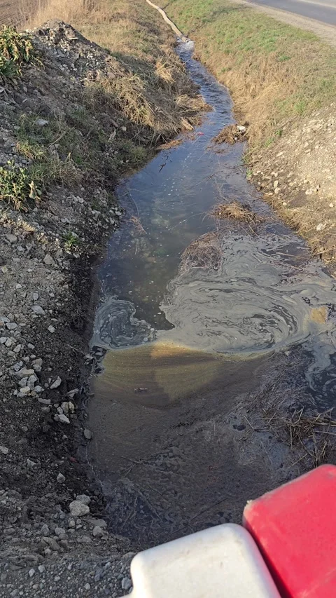 Flood emergency pumping system moving muddy wastewater through thick hose t.. Stock Footage 330584124