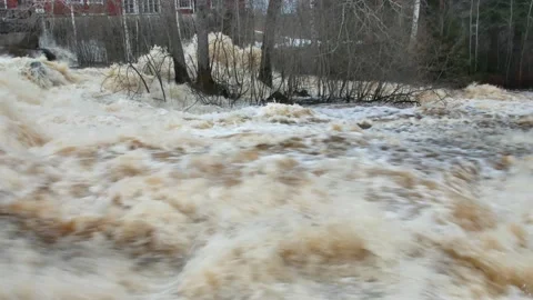 Flood on fast flowing spring river, Lappeenranta Finland Stock Footage 185921688