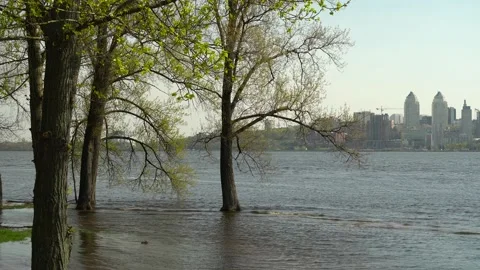 Flood river in spring time. Overflowed river bank in city. 스톡 동영상 239370817