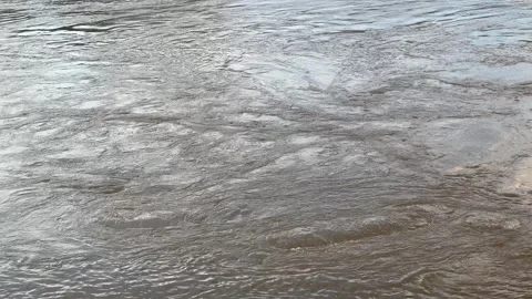 Flood water and currents of the River Severn Worcester UK Floods 2024 Stockbeeldmateriaal 261795245