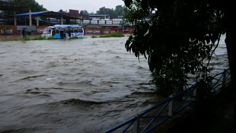 Flood water flowing in great force and speed in Manohara river during Kathma Stock Footage 286014745