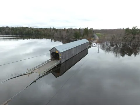 Flood Waters Covered Bridge Stock Photos