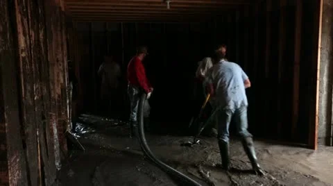Flood workers shovel mud and water in basement P HD 2070 Stock Footage 11507804
