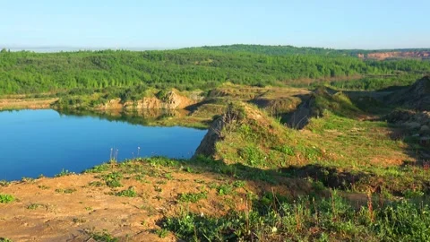 Flooded dolomite quarry Stock Footage 250930703