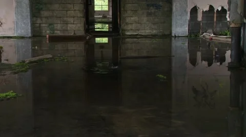 Flooded Dripping Room of Decrepit Ruin Pullback Reveal Stock Footage 12453631