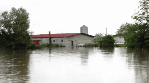 Flooded farm. Environmental disaster. Damaged building after big rain storm. Stock Footage 38852811