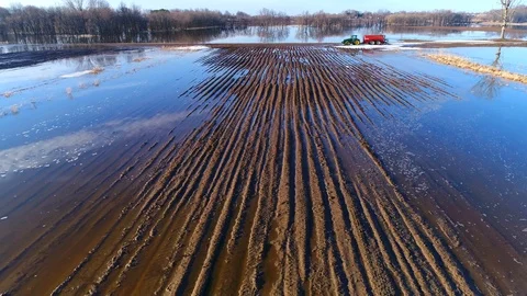 Flooded farm fields in Springtime flooding as snow melts Stock Footage 89136890