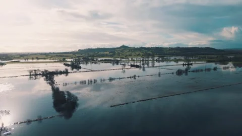 Flooded fields and land in Somerset, UK after heavy rainfall Stock Footage 337167862