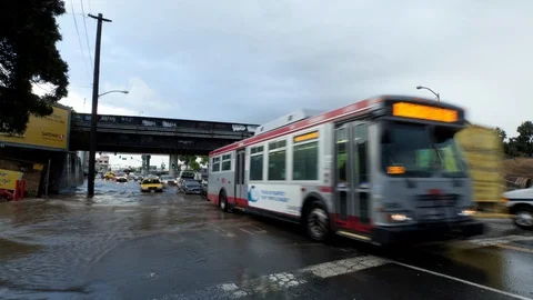 Flooded intersection in a city time lapse Stock Footage 98696108