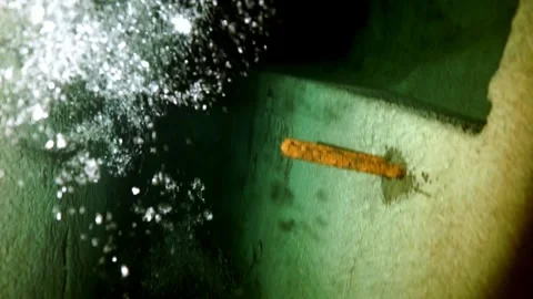 Into the flooded labyrinth exploring caves beneath Budapest Stock Footage 312078878