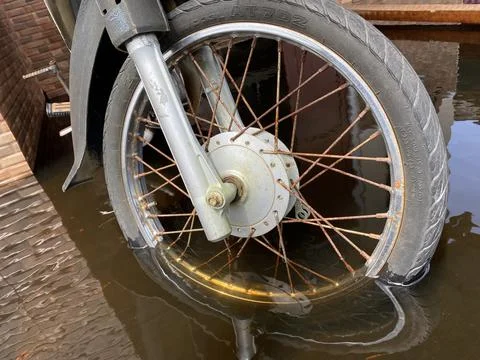 Flooded Motorcycle Wheels Stock Photos