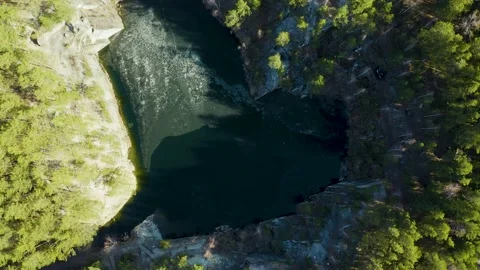 Flooded quarry in shape of a heart surrounded by forest, talcov stone, Ural 스톡 동영상 165305832