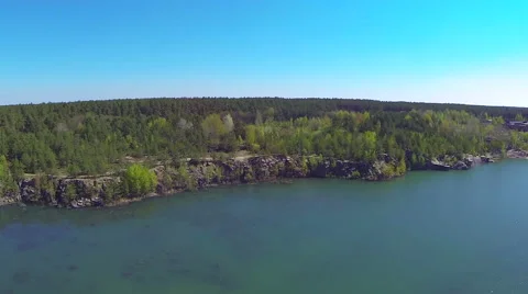 Flooded quarry. The view from the heights. Panoramic Stock Footage 49825562