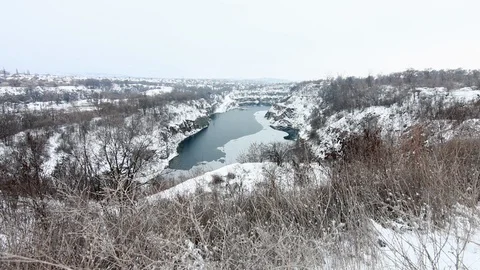 Flooded quarry in winter Stock Footage 119173978