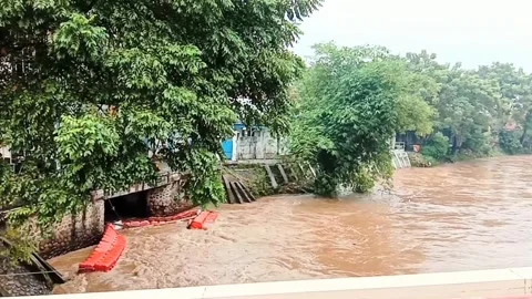 Flooded River After Heavy Rainfall – Overflowing Water Near Residential Area Stock Footage 276310970