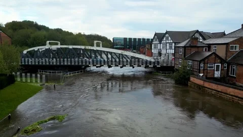 Flooded river in UK Stock Footage 254029801